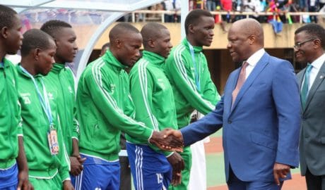 Kabaka greets Buddu players before last years Airtel Masaza Cup final kick off at the Namboole stadium.