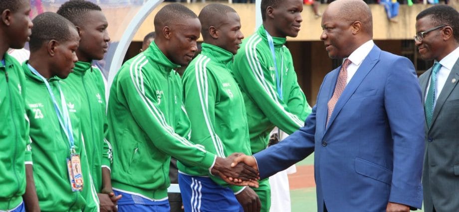 Kabaka greets Buddu players before last years Airtel Masaza Cup final kick off at the Namboole stadium.