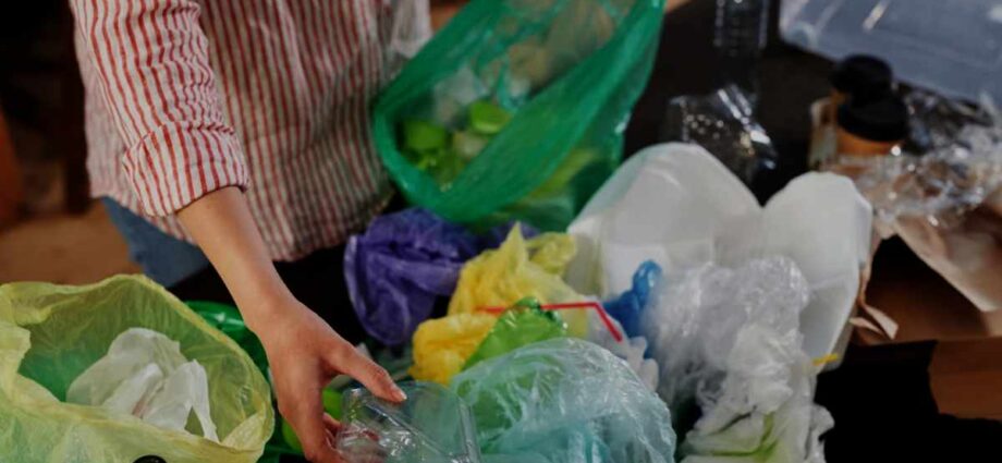A person sorting out plastic and trying to aim for zero-waste.